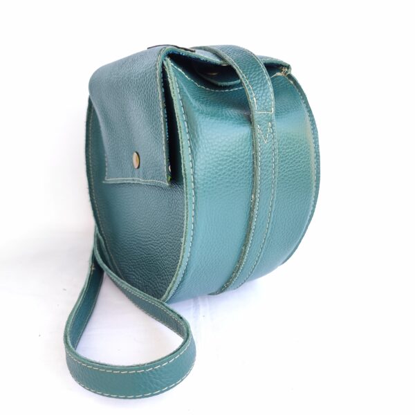 sac rond cuir vert.